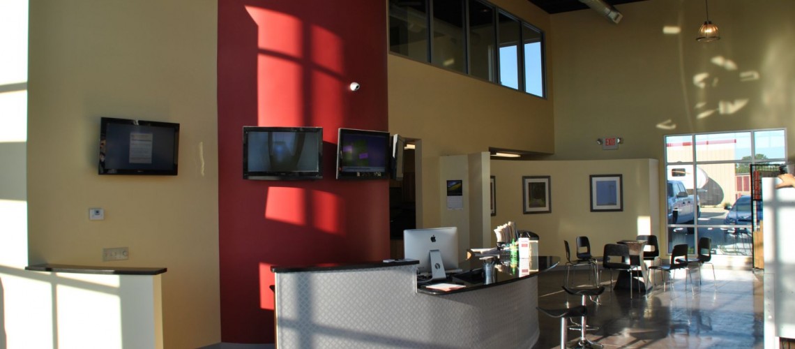 The office interior feels more like an upscale hotel than a self-storage facility. Equipped with multiple monitors to highlight the site’s security, the comfortable space welcomes clients.