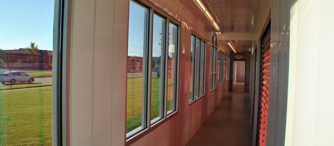 The temperature controlled building attached to the office features a large bank of windows to showcase the doors, especially at night. This approach allows for a good balance of aesthetic appeal while highlighting the function of the building. The largest source of new business to most self-storage facilities is “drive-by,” so this is an important consideration during the planning phase. 