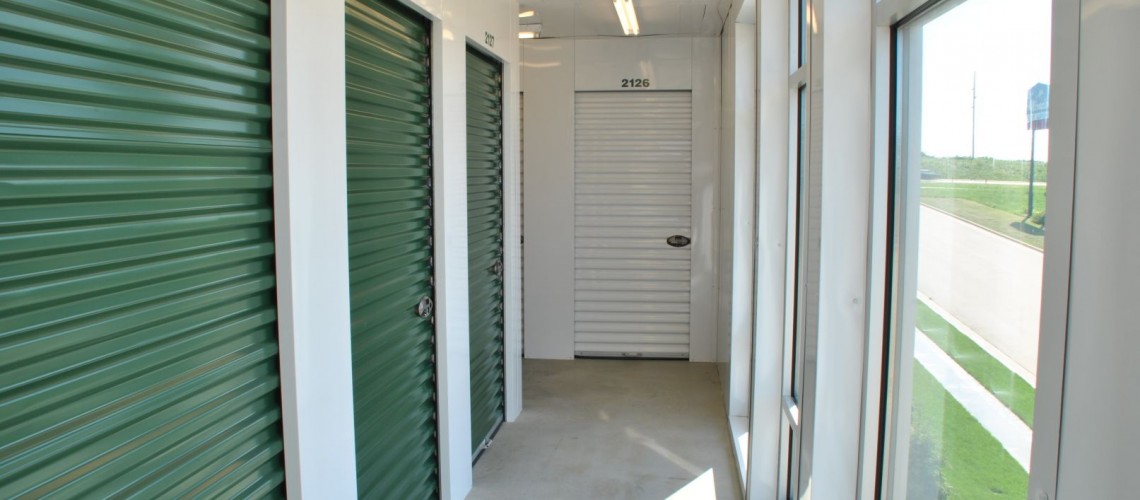  In the halls with windows, contrasting green doors and additional lighting was installed to maximize highway visibility.