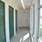  In the halls with windows, contrasting green doors and additional lighting was installed to maximize highway visibility.