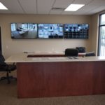 The office features large monitors as part of the state of the art camera system.