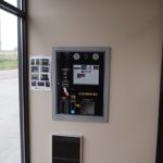 The kiosk can rent units, take payments, and dispense locks. It connects to a remote call center to provide personal service if needed.