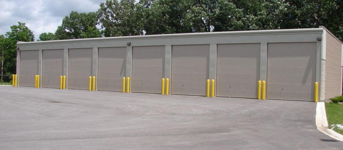 This building has a 14' wide bays and a 16' eave height. 12' x 14' tall sectional doors. Trachte recommends using an automatic door operator due to the weight of the door.