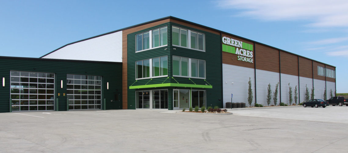This three story self-storage facility features a heated drive through for customer unloading and pick up.