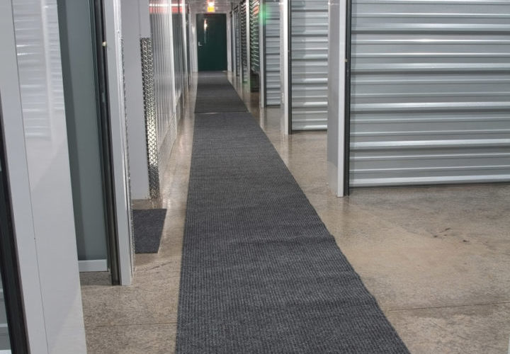 Inside the climate controlled storage buildings, hallways are carpeted.