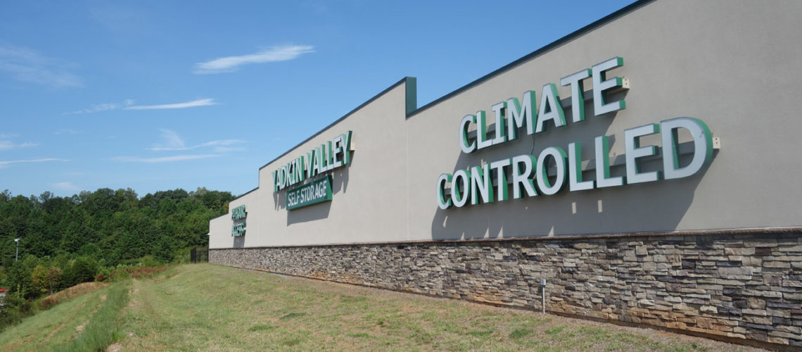 Large lettering helps identify the property which is set back significantly from the highway. The sign communicates that climate controlled storage is available.