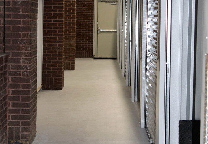 The front porch area of the grocery store was enclosed to create additional rental units.