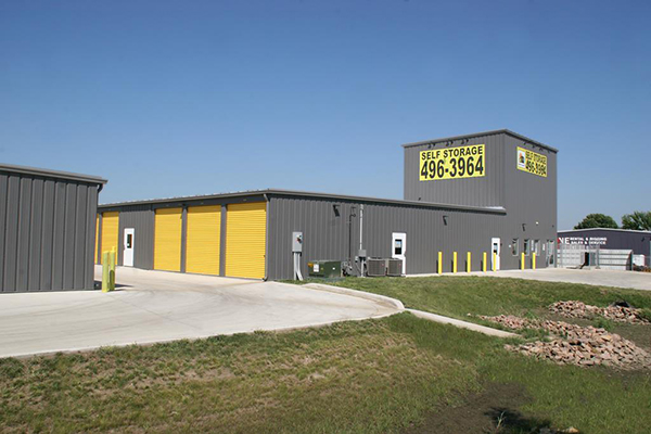 Insulated, non-insulated and boat/RV charcoal self-storage buildings with charcoal trim and yellow doors.