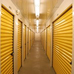 Corridor in bright white with yellow doors.