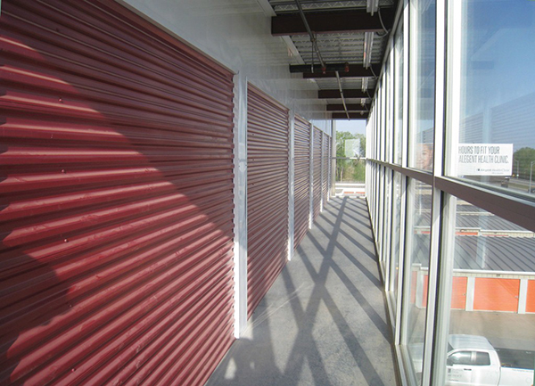 Large windows facing the street showcase the doors to market
the facility as self-storage.