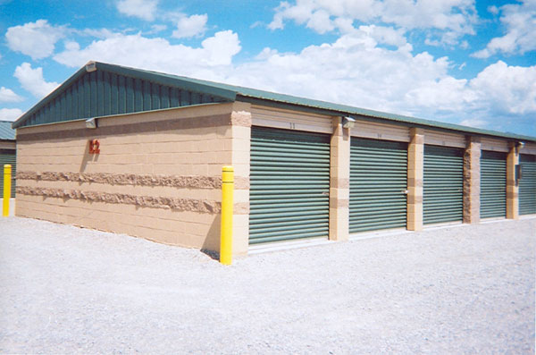 Contrasting block is used on this self-storage facility. The end wall metal panel is color matched to the evergreen roof instead of the block side walls.