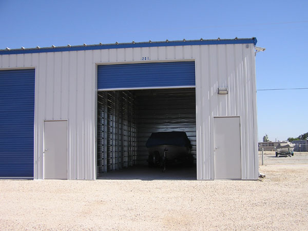 Swing doors can be included in large units for easier access. However this means creating wider than usual units. The wider units reduce the number of units you'll fit into the space, and can reduce the project income significantly.