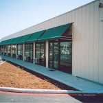 This building features commercial spaces in a customized version of a Trachte self-storage building.
