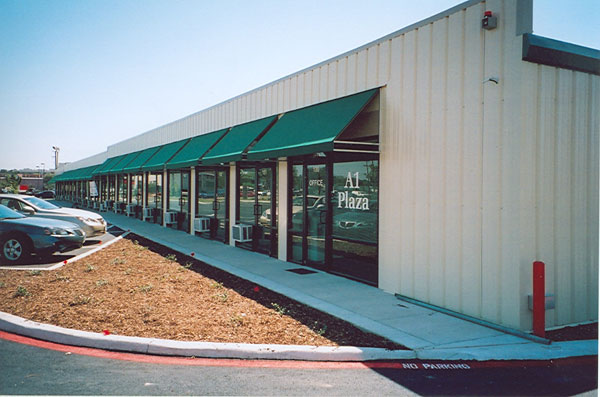 This building features commercial spaces in a customized version of a Trachte self-storage building.